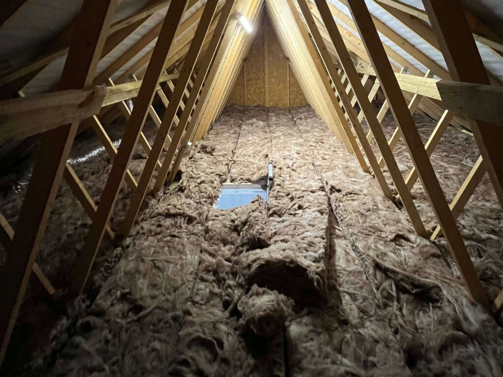 Before photo of an unboarded loft space in Sussex